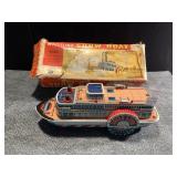 WHISTLING SHOW BOAT, TIN BATTERY OP TOY WITH