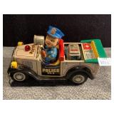 BATTERY OPERATED TIN POLICE CAR