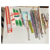 KNITTING NEEDLES AND RUG
