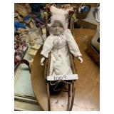 BISQUE DOLL IN SLEIGH