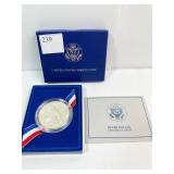 1986 ELLIS ISLAND SILVER DOLLAR