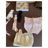 BABY SOCKS WORN AND NEW, MITTENS, PANTS, ETC.