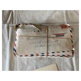 STACK OF BOUND HANDWRITTEN LETTERS, TOP ONE POST