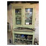 WOOD ANTIQUE 2 PIECE GREEN CABINET IN BASEMENT