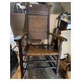 ROCKING CHAIR SOLID BACK HAS SMALL TEAR IN