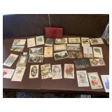 CARD HOLDER AND 1917-20 POSTCARDS