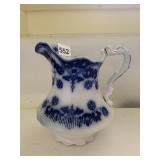 BLUE FLOW PITCHER, REPAIRED HANDLE