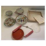 2 ASIAN THEME TEACUPS AND SAUCERS AND TEA