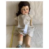 26" COMPOSITION DOLL W/ CLOTH BODY, NECKLACE, ONE