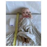 COMPOSITION DOLL 10" LONG W/ DRESS