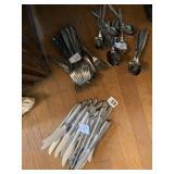 FLATWARE 23 FORKS, 24 SPOONS, 24 KNIVES STAR