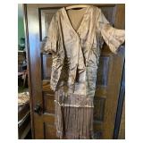 BROWN SILK DRESS PLEATED BASE DOES HAVE TEAR