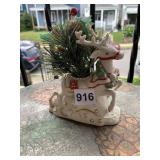 REINDEER W/ ARTIFICIAL ARRANGEMENT & IRON BASE