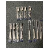 STERLING FLATWEAR SET SERVICE FOR 4. 12OZT