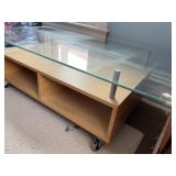 GLASS TOP COFFEE TABLE W/ LOWER SHELF ON CASTERS