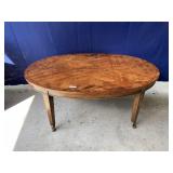 OVAL WOODEN COFFEE TABLE ON WHEELS, 17 H X 42 W X