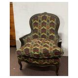 CARVED WOOD UPHOLSTERED ARMCHAIR WITH DOWN SEAT