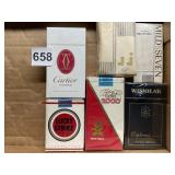 6 PACKS CIGARETTES- CARTIER, LUCKY STRIKE,