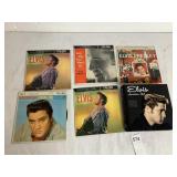 5 ELVIS PRESLEY 45 RECORDS AND BOOK ELVIS: