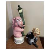 BUTLER AND MUSICAL ELEPHANT