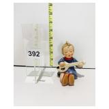 HUMMEL TM2 SITTING GIRL WITH MUSICAL INSTRUMENT