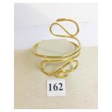 GOLD TONE SNAKE ARM CUFF 4" IN DIAMETER