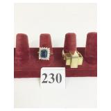 TWO RINGS SIZE 7 BLUE STONE AND MODERN GOLD TONE