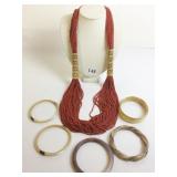 MULTI STRAND BURNT ORANGE SEED BEAD NECKLACE FIVE