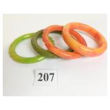 GREEN AND ORANGE POSSIBLY BAKELITE BANGLE