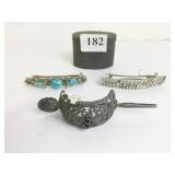 THREE HAIR BARRETTES ONE WITH TURQUOISE ONE