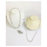 TWO CRYSTAL BEADED NECKLACES AND RHINESTONE HAIR