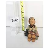 TRADEMARK I HUMMEL SITTING GIRL KNITTING WITH