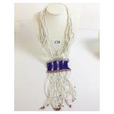 MULTI STRAND WHITE SEED BEAD NECKLACE WITH BLUE