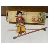 VINTAGE CLOWN ON UNICYCLE TIGHT ROPE RIDER TOY