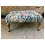 BRASS LEG OTTOMAN WITH FLORAL UPHOLSTRY, ONE LEG