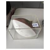 SIGNED NFL FOOTBALL IN LUCITE HOLDER
