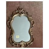 SYROCO GOLD TONE ORNATELY FRAMED WALL MIRROR,
