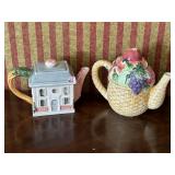 PAIR OF FIGURAL TEA POTS