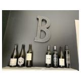 LETTER B AND DISPLAY EMPTY BOTTLES