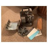 BELL AND HOWELL FILM STRIP PROJECTOR