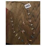 CARVED BIRD AND POLISHED STONE NECKLACE