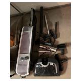 PARTS AND PIECES OF AN ORECK ELEVATE VACUUM