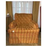 ORANGE AND GOLD STRIPED ARMCHAIR