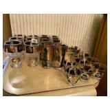 CORA BLACK AND GOLD COIN DOT GLASSWARE, 28 TOTAL