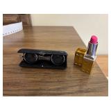 COMPACT SPORTS GLASSES AND PINK LIPSTICK