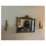 GOLD TONE FRAMED WALL MIRROR WITH DAMAGE AT TOP,