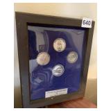 4 COINS FRAMED "MILESTONES IN MANNED FLIGHT" BY