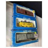 THREE ROLLING STOCK LIFE-LINE TRAIN CARS