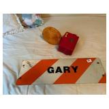 METAL ROAD SIGN WITH THE NAME GARY AND HAZARD