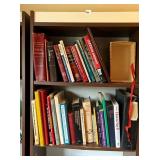 BOOKSHELF FULL OF TEACHING AND MEDICAL REFERENCE